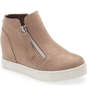 • 2" heel
• Side zip closures
• Textile upper and lining/synthetic sole